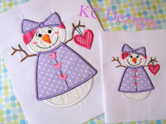 Snow Lady Holding Heart Applique Design Review